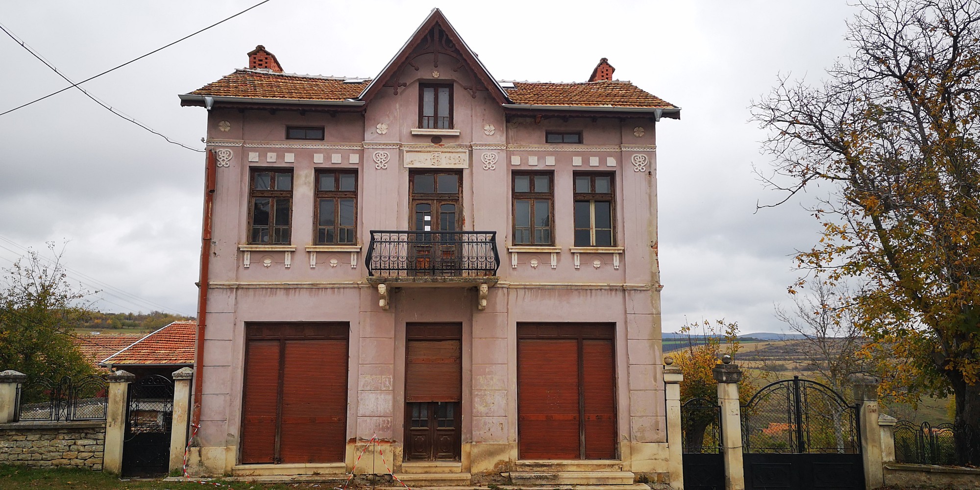 General view of a historic two-storey house in Bodenets, Bulgaria.